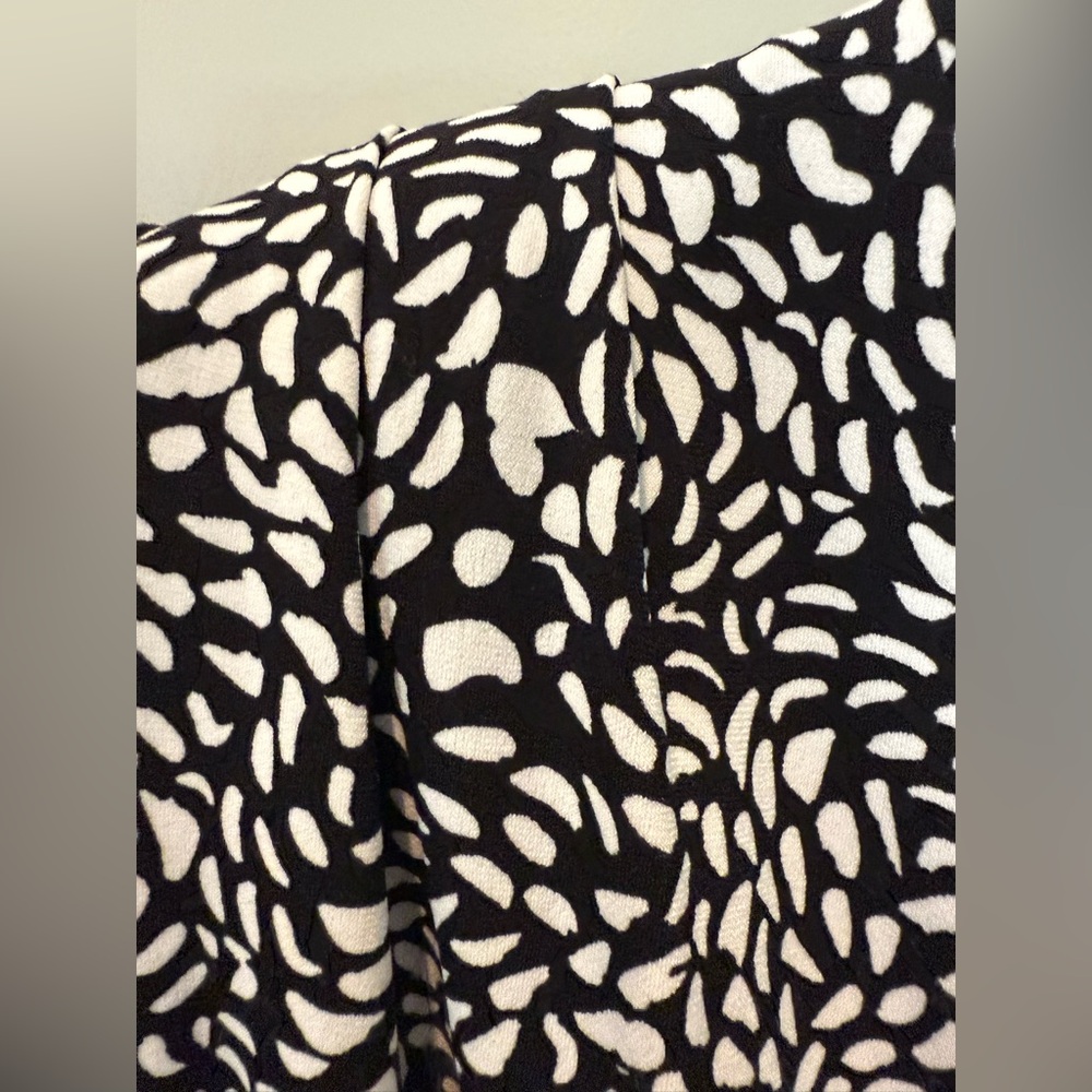 Super popular jumpsuit. Feminine features. Size 10/12 M - Picture 2 of 12